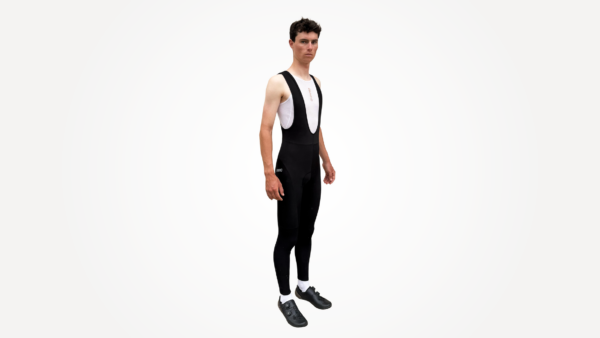 Cuissard technique noir avec bretelles, idéal pour le cyclisme, porté par un mannequin.