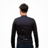 Maillot manche longue noir en tissu technique, vue arrière avec éléments de design pour cyclisme.