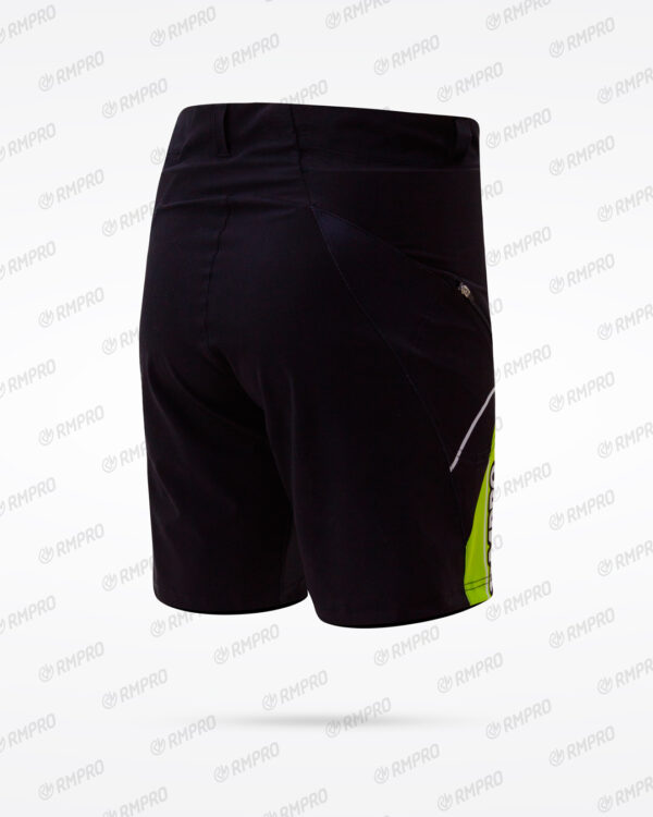Cuissard technique noir avec détails réfléchissants et accents verts, idéal pour le cyclisme et la course.