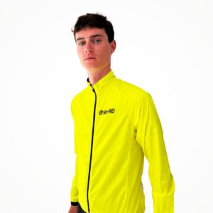 Veste coupe-vent jaune fluo pour cyclisme avec logo visible.