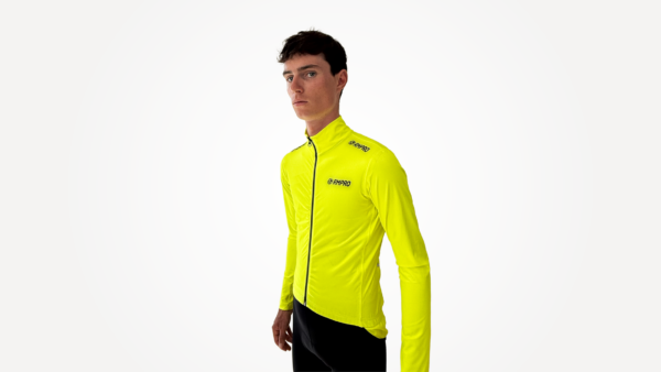 Veste de cyclisme jaune fluo avec fermeture éclair et détails techniques visibles.