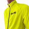 Veste coupe-vent jaune fluo personnalisée avec logo RMPRO, adaptée pour le cyclisme et la course.