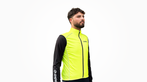 Gilet d'hiver technique jaune fluo avec manches noires, conçu pour le cyclisme.