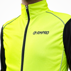 Veste technique hiver à manches longues, en jaune fluo et noir, avec logo RMPRO sur la poitrine.