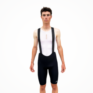 Cuissard cycliste technique noir avec bretelles, en position statique.