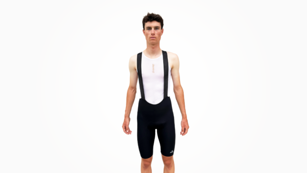 Cuissard cycliste technique noir avec bretelles, en position statique.
